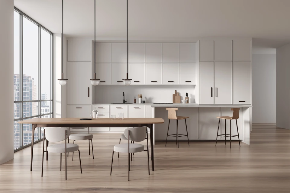 Cuisine moderne minimaliste avec îlot central et coin repas